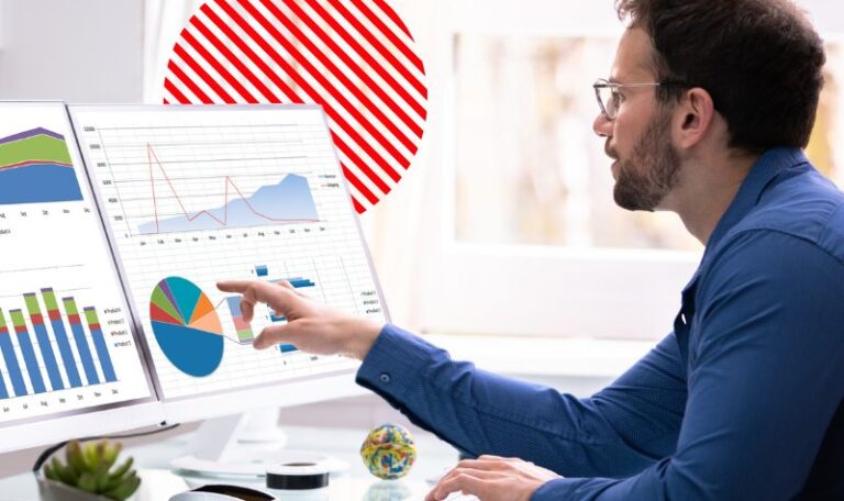 Gestor analisando gráficos e indicadores em dashboards, representando o uso de dados empresariais para acompanhar resultados e apoiar decisões estratégicas.